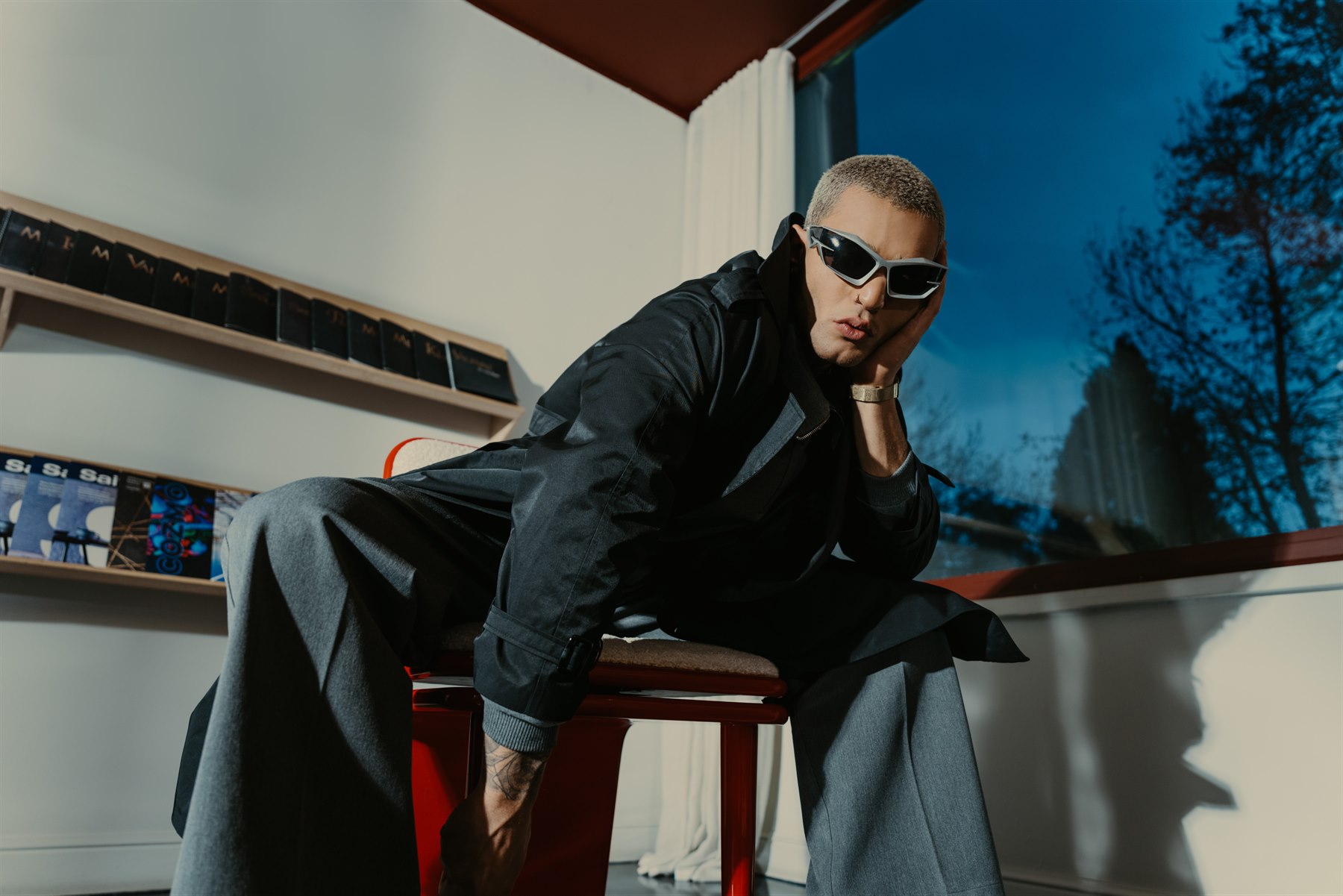 Model wearing a black technical jacket
